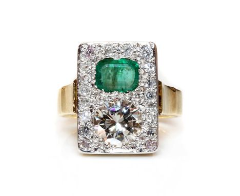 A Continental emerald and diamond plaque ring, with an emerald cut emerald and a brilliant cut diamond, with an estimated wei