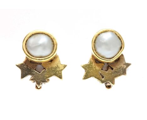 A pair of gold cultured freshwater pearl earrings, by Clare Murray,a cultured freshwater pearl, rub set, with three gold star