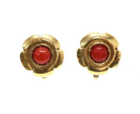 A pair of coral flower head earrings, by Clare Murray,with a coral cabochon, spitch set to the centre of five petalled flower