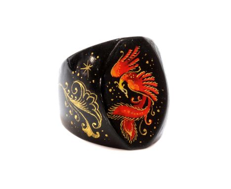 A Russian papier-mâché hand painted ring,with a navette shaped head and tapered shoulders, with hand painted decoration, to a