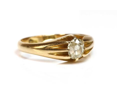 A gentlemen's single stone diamond ring,with a brilliant cut diamond, estimated as approximately 0.65ct, claw set to a scallo