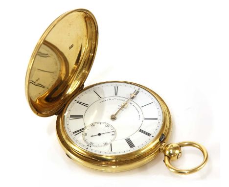 An 18ct gold key wound hunter pocket watch,55mm diameter with a white enamel dial, black Roman numerals and subsidiary second