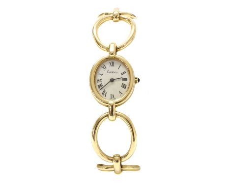 A ladies' 18ct gold L.V. Chopard mechanical bracelet watch, by Kutchinsky, c.1968,with an ivory coloured oval dial, with blac