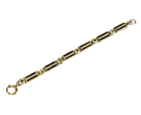 An antique gold and enamel bracelet,with a series of rectangular plaque links, with bands of mauve guilloché enamel to each s