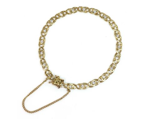 An 18ct gold diamond set bracelet, by Cropp and Farr, c.1980,with sets of filed curb links. A brilliant cut diamond, grain se