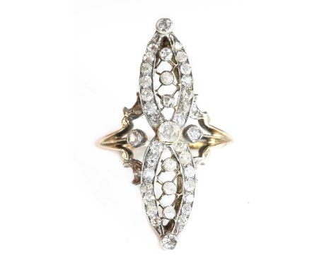 A Belle Époque diamond set fingerline ring,possibly American. With an old Swiss cut diamond, rub set to the centre. An open m