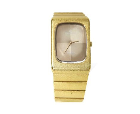 A gentlemen’s 18ct gold Omega ‘Constellation’ automatic bracelet watch, c.1970, with a rectangular case, 30 x 48mm, with a tw