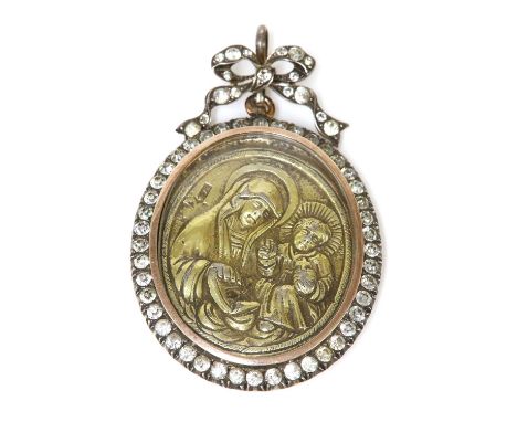 A Continental silver and gold paste set glazed locket/pendant,containing a Russian silver gilt icon. The oval locket with a b