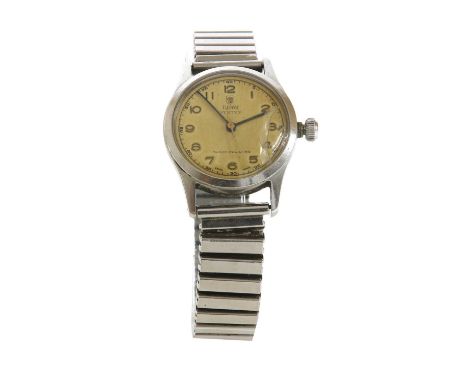 A gentlemen's stainless steel Tudor 'Oyster' mechanical strap watch no. 4453, 31mm diameter with a silvered dial, discoloured