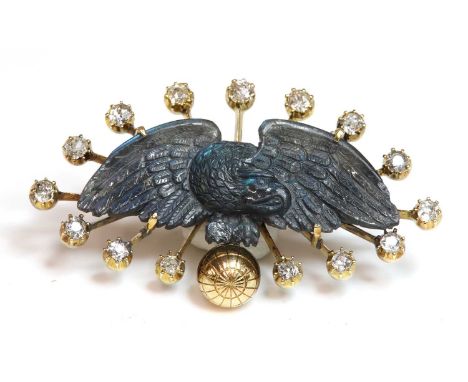 A late Victorian carved labradorite and diamond brooch, c.1890,with a carved labradorite eagle with outstretched wings, claw 