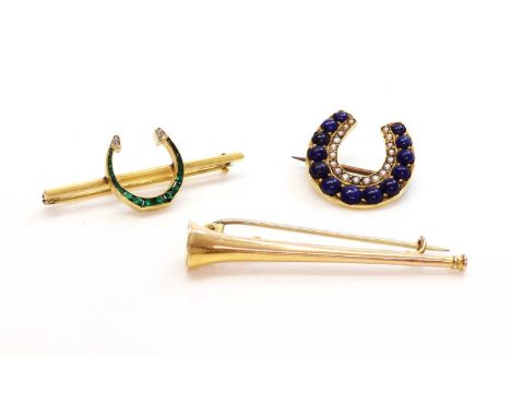 An emerald and diamond horseshoe bar brooch, the horseshoe channel set with calibré cut emeralds and with old cut and rose cu