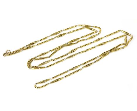 A Victorian gold guard chain,with elongated lozenge shaped sections, with pierced detail, between bead style links with a lat