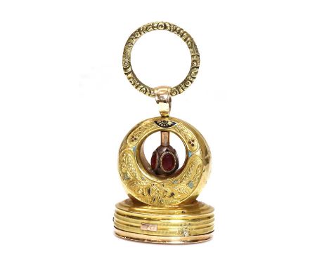 A Regency gold and enamel musical seal/fob,probably Swiss. A closed crescent style top decorated with wheat ear husks and bow