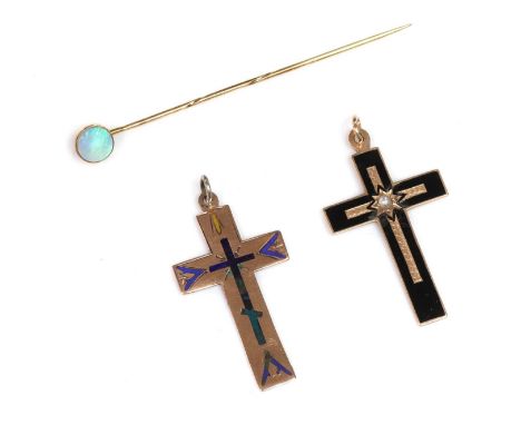 Two Russian gold enamel cross pendants,one with black enamel and star set with a split pearl, marked 585, the other with blue