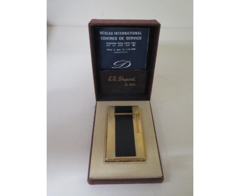 A Dupont laque de chine gas lighter with box and booklet, reasonably good, engraved initials, sparks, some small marks and to