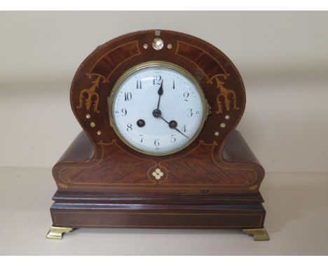 An inlaid mahogany mantle clock, 20cm tall, working, case in restored condition, chips to dial 