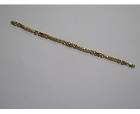 An 18ct 750 gold bracelet 18cm long set with three ruby like stones, approx 7 grams, in good condition 