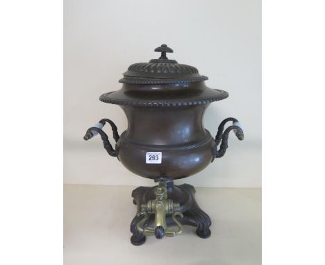 A bronze Victorian samovar with cast iron heat weight, 43cm tall 