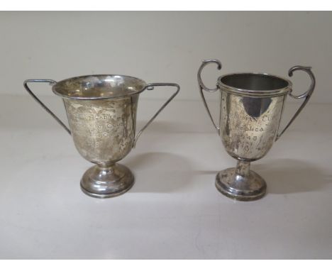 Two silver trophy engraved cups, 10cm and 9cm tall, approx 4 troy oz 