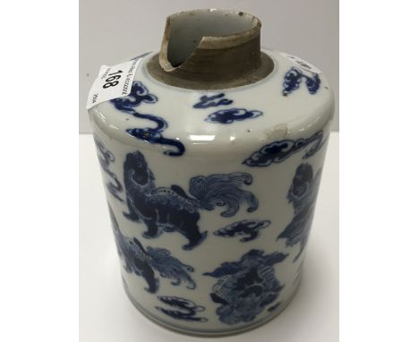 A 19th Century Chinese blue and white cylindrical tea caddy, painted with Buddhist lions amongst clouds, raised on a circular
