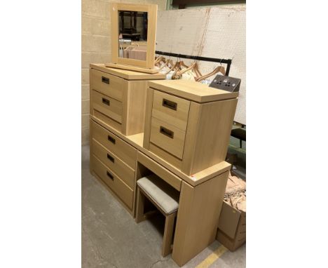A modern beech effect bedroom suite comprising four drawer dressing table, 175 cm long x 44.5 cm deep x 89 cm high, a bedside