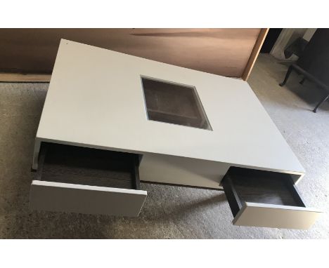 A Ransom Gallery white leather covered coffee table with glass top and drawers, bespoke made in a limited edition to house th