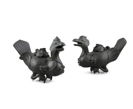 A PAIR OF BRONZE 'DUCKS' INCENSE BURNERS  Probably China and late Ming Dynasty  Lively depicted with widely open beaks and to