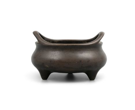 A XUANDE MARKED BROWN PATINA BRONZE INCENSE-BURNER China, Qing Dynasty, Likely 18th century With a compressed globular body, 