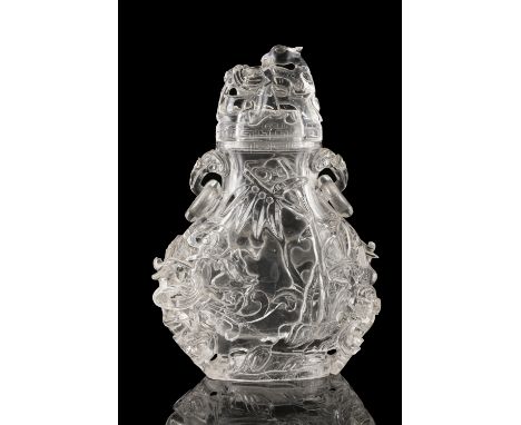 A LARGE ROCK-CRYSTAL LIDDED VASE WITH LOOSE RINGS HANDLES China, Qing Dynasty, 19th century Carved out an almost flawless sto