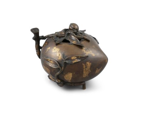 A GOLD SPLASHED 'PEACH' BRONZE INCENSE BURNER China Shaped as a peach encircled by a gnarled branch with leaves and two addit