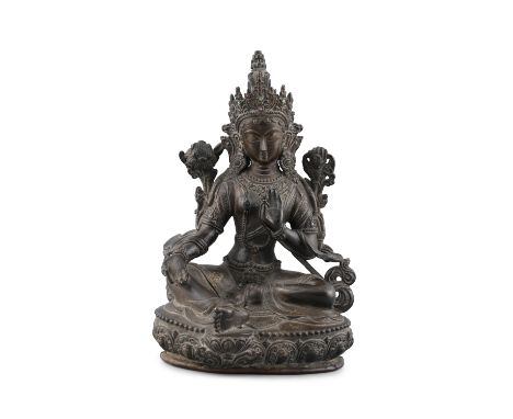 A BRONZE FIGURE OF A SEATED TARA Possibly Nepal and 19th century The goddess is seated in rajalalisana on a lotus base, the h