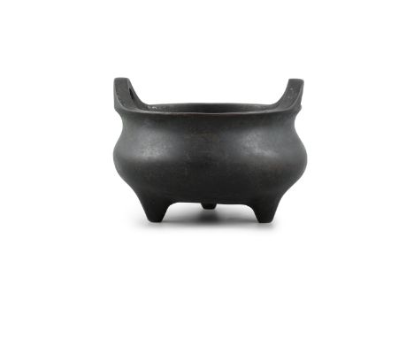 A BRONZE INCENSE BURNER China, Antique With a globular body, resting on three feet, with a cast apocryphal mark of Emperor Xu
