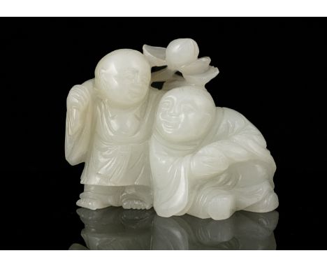 A MUTTON FAT WHITE JADE GROUP OF HEHE / ERXIAN 和合二仙 China, Antique, Possibly Ming Dynasty Carved in the round from a milky an