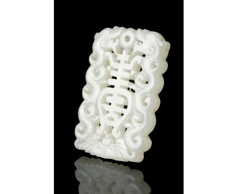 AN OPEN-WORKED JADE 'DRAGON' PLAQUE / PENDANT / PEI China, Qing Dynasty, 19th century Carved with two confronted dragons figh