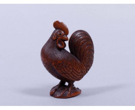 Netsuke, Japan, wohl Meiji-Zeit, Buchsbaum Hahn auf Awabi-Muschel, eingesetzte Hornaugen, unsign., H 4,5cm, geringe Altersspu