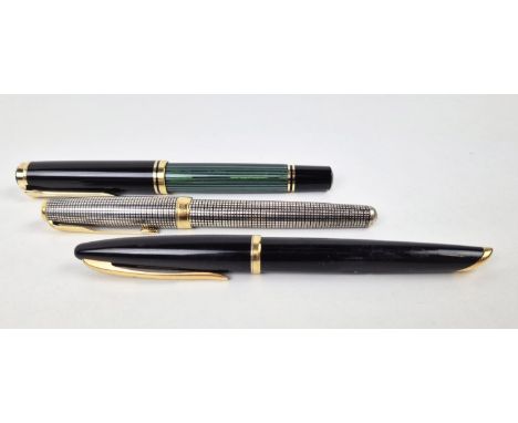 FOUNTAIN PENS, three, a German pelikan green stripe screw cap with 18ct-750 marked nib and pelikan bill clip, a parker sonnet