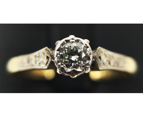 AN 18CT YELLOW GOLD AND PLATINUM DIAMOND SOLITAIRE RING, the round brilliant cut diamond of approximately 0.20 carats, early 