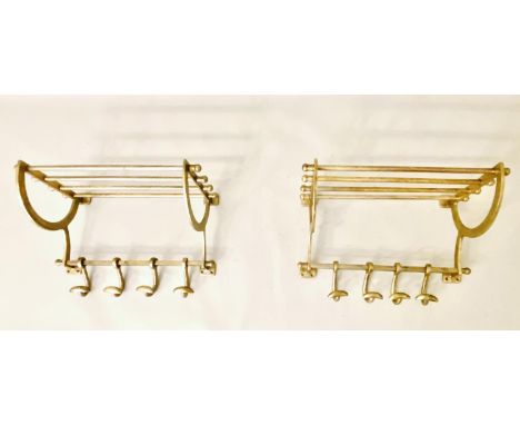 LUGGAGE RACKS, a pair, gilt metal, each with four hangers, 35cm H x 46cm W x 27cm. (2)