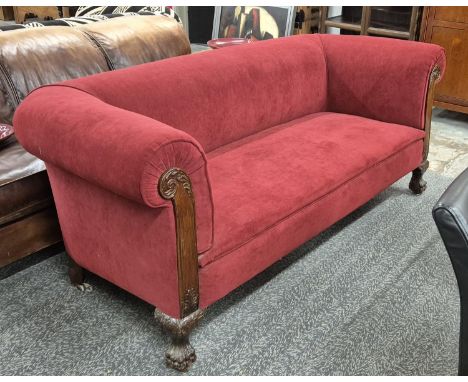 CHESTERFIELD SOFA, in claret upholstery with carved mahogany detail, and claw and back feet, 188cm W x 80cm H x 56cm D.