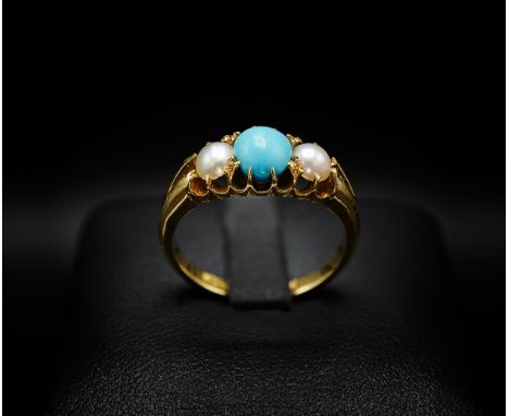 AN EDWARDIAN 18CT YELLOW GOLD TURQUOISE AND SEED PEARL DRESS RING, Birmingham 1901, the central turquoise cabochon flanked by