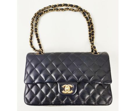 CHANEL CLASSIC DOUBLE FLAP BAG, with black quilted lambskin, 2010-11 serial sticker 14890452, gold tone hardware with signatu