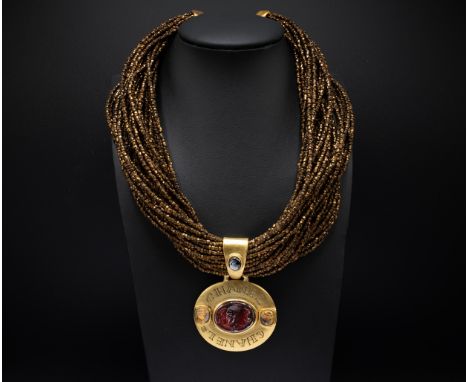 CHANEL CHOKER, multi rows of iridescent bronze beads, the centre features a large gilt metal Byzantine style medallion adorne