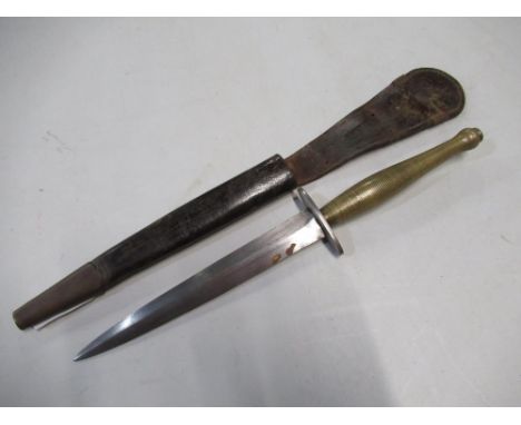 Fairbairn-Sykes B2 commando knife with 6 1/2" double edged stiletto blade, the steel crosspiece stamped with broad arrow mark