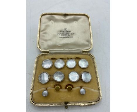 Two pairs of 9ct yellow gold mother of pearl cufflinks and matching studs, stamped 9ct &amp; Pt 