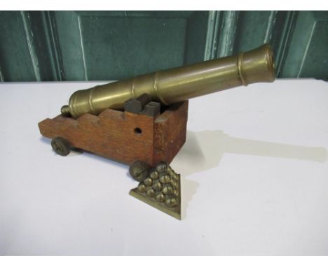 Large scale model of a brass cannon with 10" barrel 