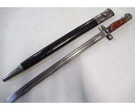 British 1907 Wilkinson Pall mall bayonet with various stamped markings, blade complete with sheath 