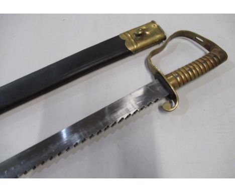 British Victorian Wilkinson's sword pioneers sidearm, with 22 1/4" saw back blade, stamped with various markings, with brass 