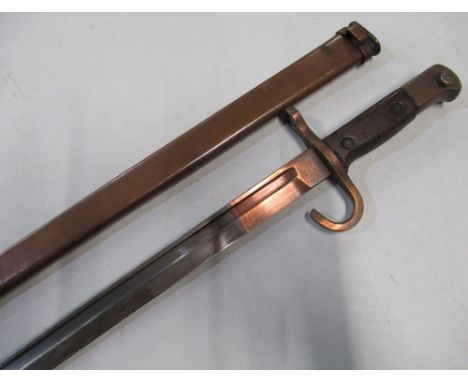 Japanese bayonet with bronzed effect cross pieces and scabbard 