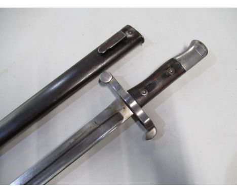 C19th continental sword bayonet with 18" blade, with various stamped markings, including butterfly pattern and X474 to the cr