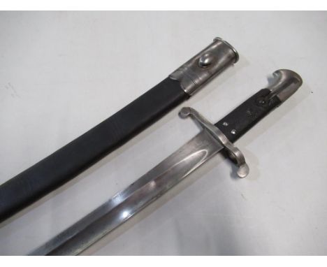 Victorian British 1860 pattern bayonet with 23" blade back strap stamped G.WB complete with scabbard.  Grip lock stamped 752 